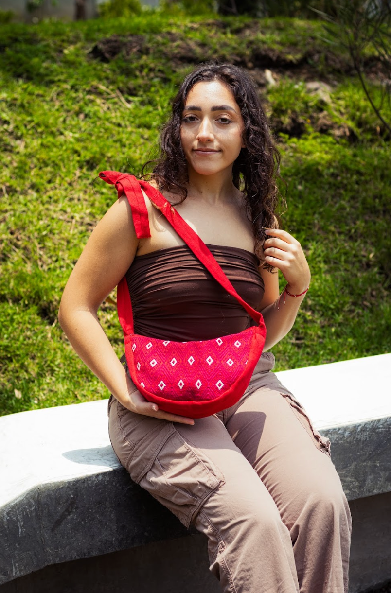 Red fanny pack with red wine